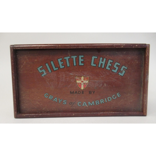 217 - A 1930s Grays of Cambridge Silette chess set, the catalin chessmen in black and 'marbled' yellow, th... 