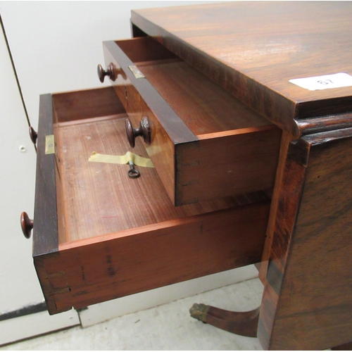 67 - An early 19thC rosewood Pembroke style work table, the fall flaps with round corners, over two shall... 