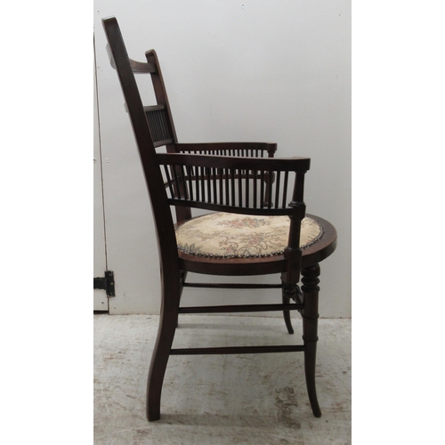 7 - A lady's Edwardian string inlaid mahogany framed and marquetry boudoir chair with a spindled back an... 