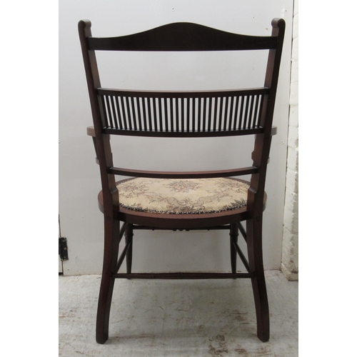 7 - A lady's Edwardian string inlaid mahogany framed and marquetry boudoir chair with a spindled back an... 