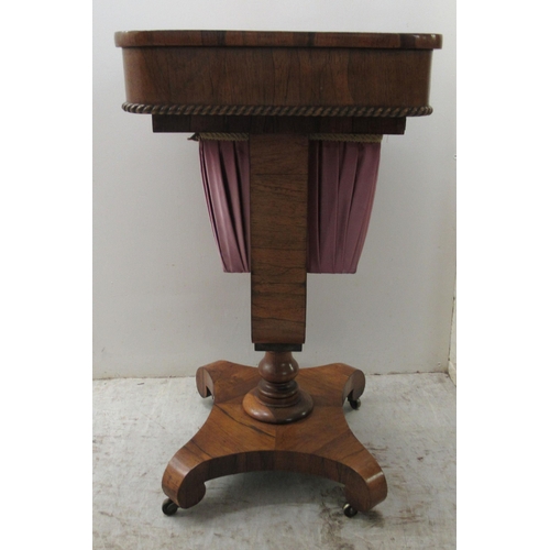 71 - A mid 19thC rosewood work table, the drawer over a retractable, pleated fabric covered wool well, el... 