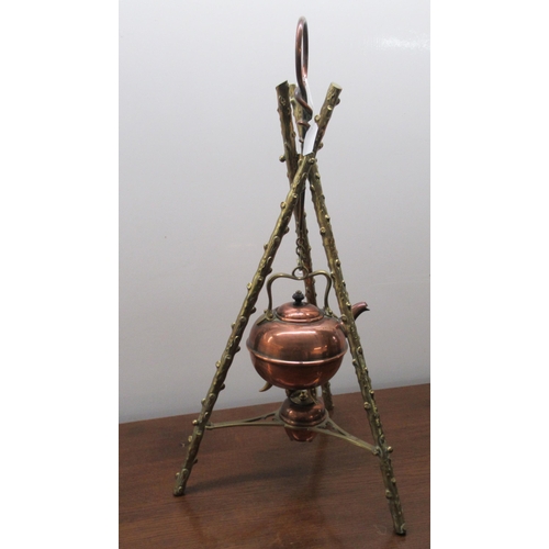 76 - A late 19thC copper and brass kettle and spirit burner, set in a naturalistically cast tripod frame&... 