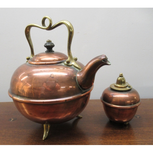 76 - A late 19thC copper and brass kettle and spirit burner, set in a naturalistically cast tripod frame&... 