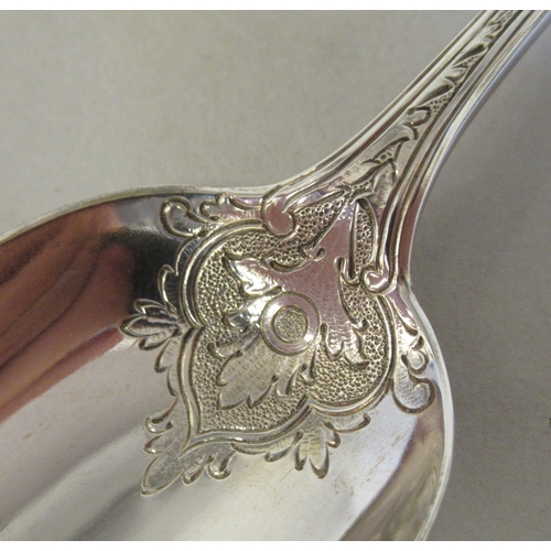 90 - A late Victorian silver Christening spoon and fork, the decoratively engraved stems respectively cas... 