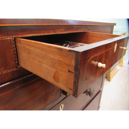 99 - A 19thC mahogany, crossbanded, satinwood string inlaid and marquetry dressing chest, featuring a cen... 