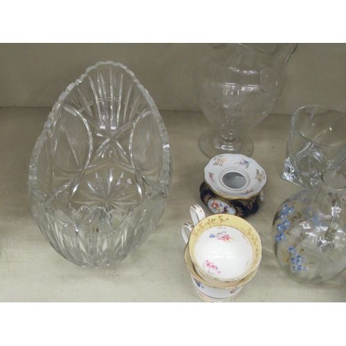 217 - Decorative glassware: to include an ovoid shaped pedestal water jug