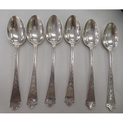 224 - A set of six late Victorian Scottish silver teaspoons with bright cut engraved stems  Glasgow 1... 