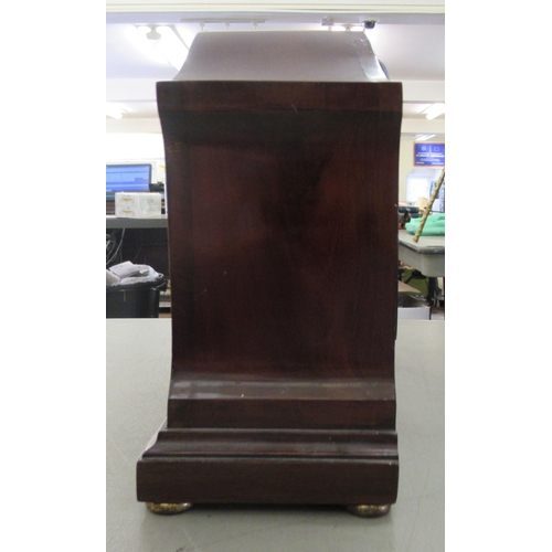 225 - An Edwardian satinwood inlaid mahogany cased mantel clock; the gong strike movement faced by an engr... 