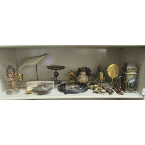 226 - Collectable ornaments and artefacts: to include an early 20thC painted Continental metal cartoon fig... 