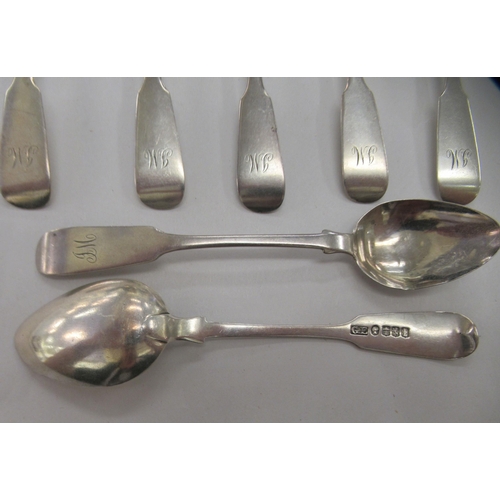 228 - A set of eight late Victorian Scottish silver fiddle pattern teaspoons and a pair of sugar tongs  Gl... 