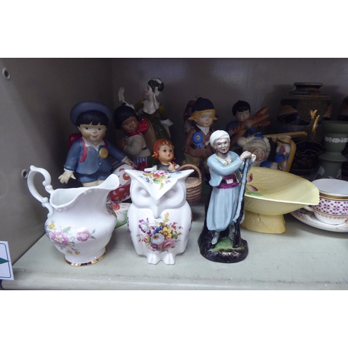 229 - Decorative ceramics and ornaments: to include a Royal Doulton china figure 'Simone'  HN2378&nbs... 