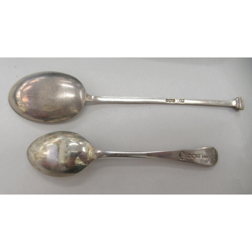 233 - A set of six silver coffee spoons; and a set of six seal end silver teaspoons  mixed marks  both cas... 