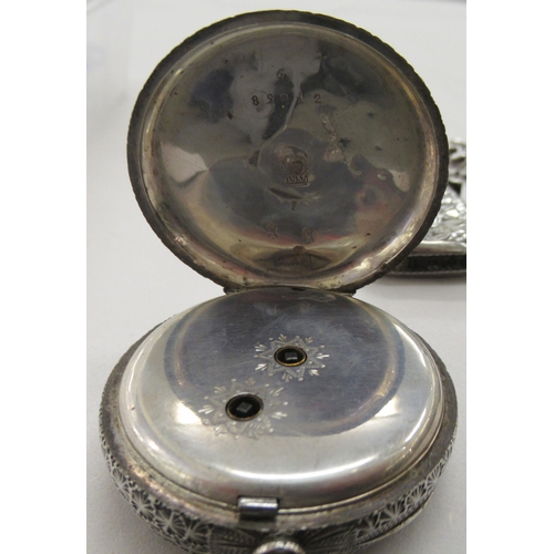 234 - Silver collectables, viz. two similar pendant vesta cases with engraved ornament; a Victorian lady's... 