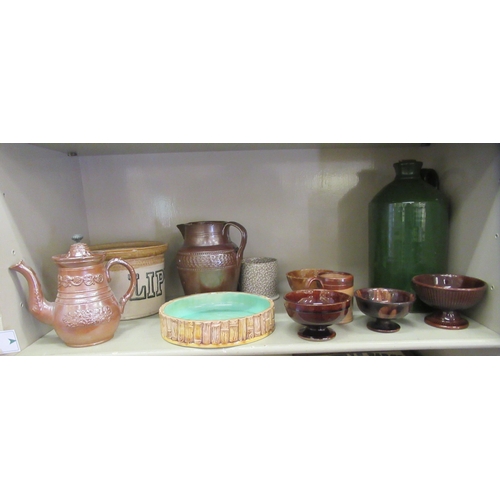 236 - Decorative and domestic ceramics: to include a Stiff & Sons, London two tone brown glazed half p... 