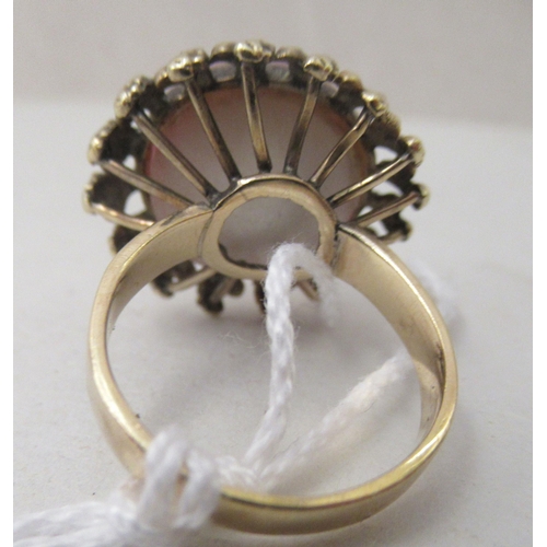 364 - A gold coloured metal, mabe set pearl dress ring 