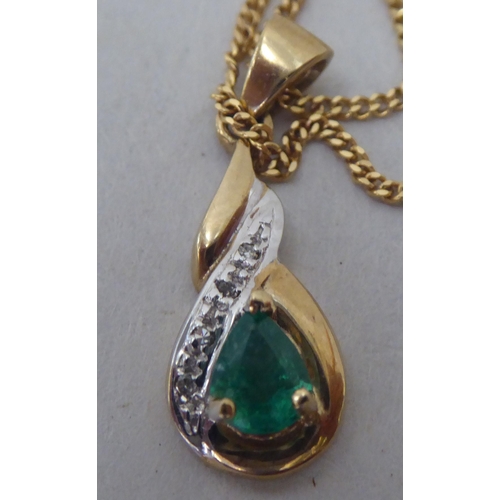 366 - A 9ct gold enamelled and diamond set pendant, on a fine neckchain  