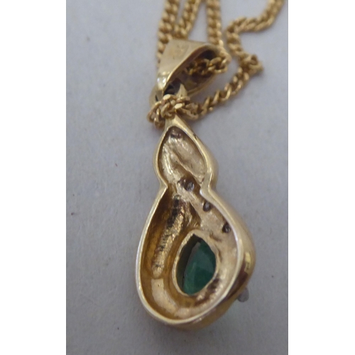 366 - A 9ct gold enamelled and diamond set pendant, on a fine neckchain  