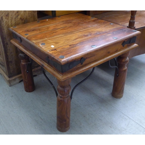 62 - Small furniture: to include a modern Indonesian teak coffee table, raised on turned legs  20