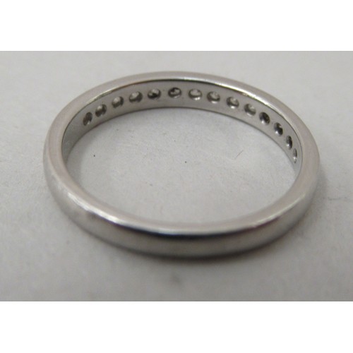 368 - A white coloured gold diamond set half eternity ring