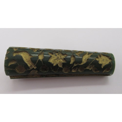 106 - A 19thC Oriental jade parasol handle, carved with animal and floral motifs  3