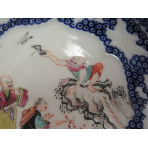 111 - A set of three late 18thC Chinese porcelain tea bowl saucers, decorated with figures  4.5