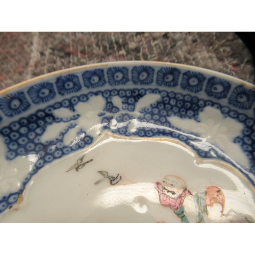 111 - A set of three late 18thC Chinese porcelain tea bowl saucers, decorated with figures  4.5