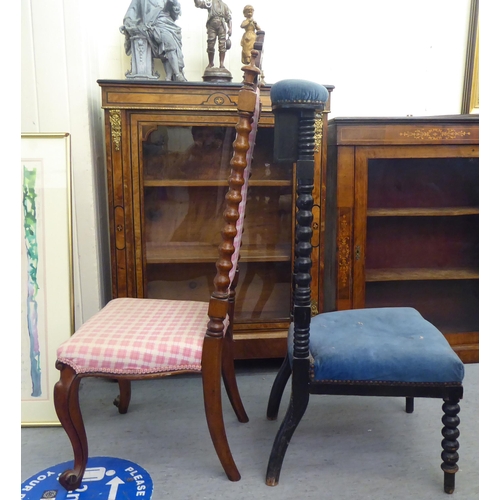 117 - A late Victorian black stained showwood framed prie dieu, upholstered in studded blue dralon and inc... 