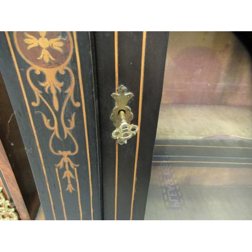 124 - A late Victorian black lacquered satinwood string inlaid and marquetry pier cabinet with gilt metal ... 