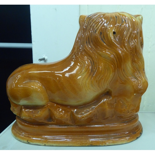 137 - A pair of late 19thC inspired, Staffordshire style, china seated lions  10