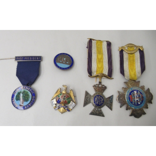 143 - Silver and enamelled badges: to include a Masonic example  mixed marks