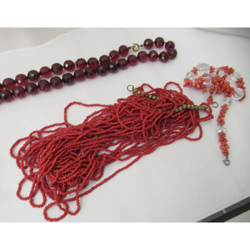 146 - Coral, amber and other irregularly cut bead necklaces and bevelled glass beads 