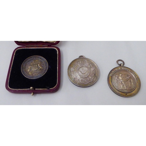 147 - Three medals: to include The Buchannan Trophy of 1925 