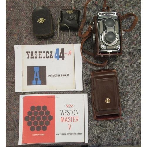 164 - A Yashica -44 camera; and a Weston Master V light meter 