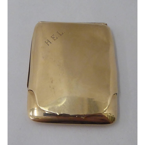 167 - A 9ct gold bookmatch holder