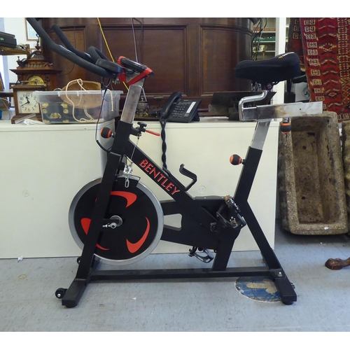 175 - A Bentley exercise bike with digital display and heart rate monitor