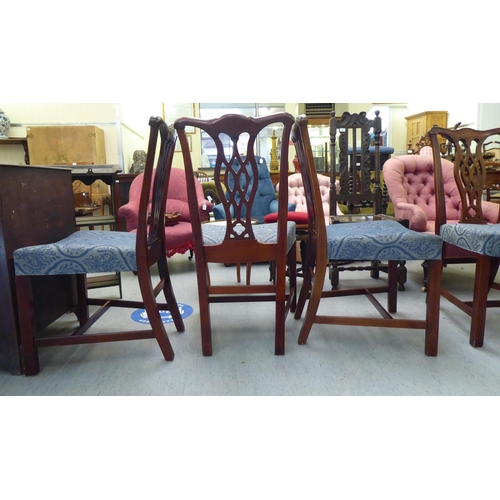 176 - A set of eight Chippendale design mahogany framed dining chairs, each with a splat back, raised on s... 