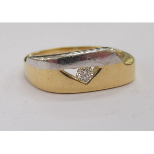 177 - An 18ct bi-coloured gold ring, set with a single diamond  stamped 750