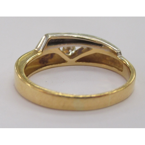 177 - An 18ct bi-coloured gold ring, set with a single diamond  stamped 750