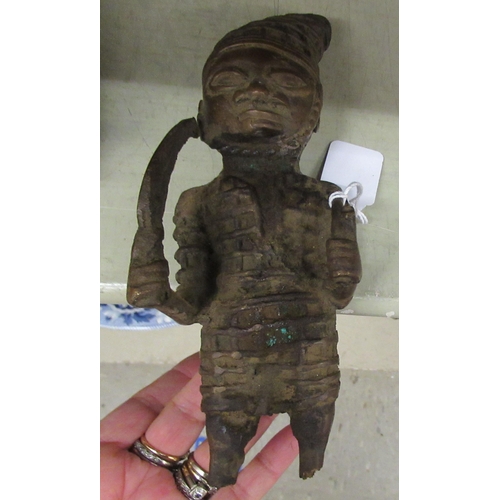 180 - A cast metal African tribal figure  12