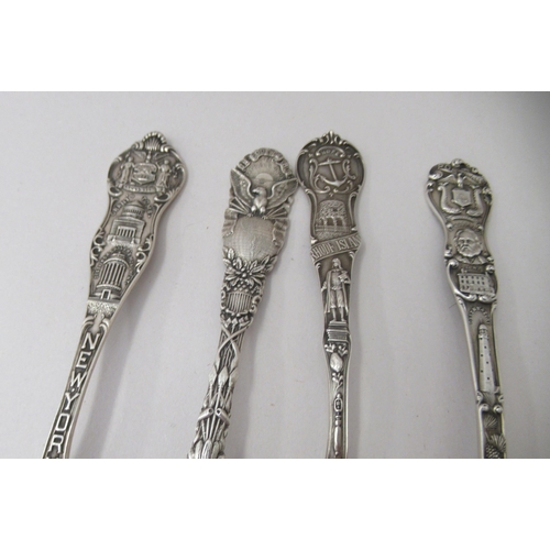 188 - A set of four American silver presentation teaspoons, representing North Dakota, New York, Rhode Isl... 