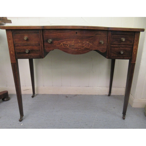 190 - An Edwardian lady's rosewood writing table with string inlaid and marquetry ornament, the top with a... 