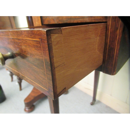 190 - An Edwardian lady's rosewood writing table with string inlaid and marquetry ornament, the top with a... 