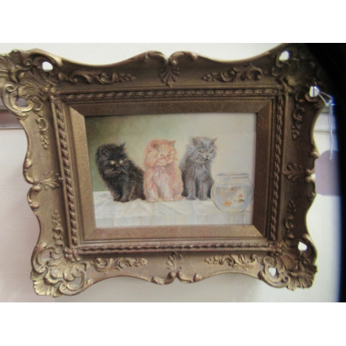 191 - A mid 20thC study, three kittens on a table, looking into a goldfish bowl  oil on panel  5... 