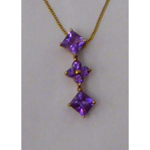 192 - A 9ct gold pendant, set with amethysts, on a fine 9ct gold neckchain 