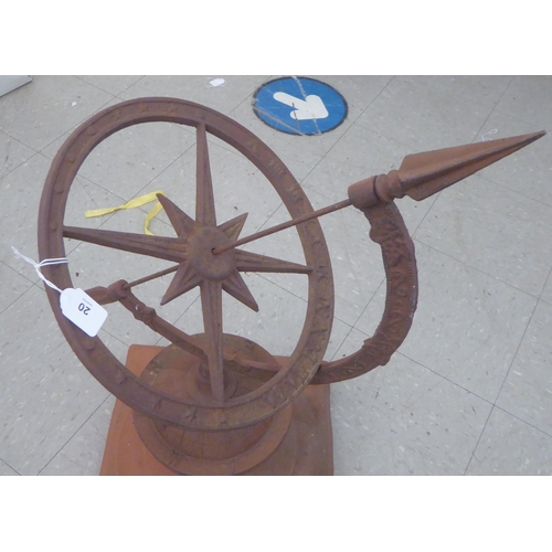 20 - A modern antique finished iron terrace ornament, a sundial set on a terracotta plinth  30