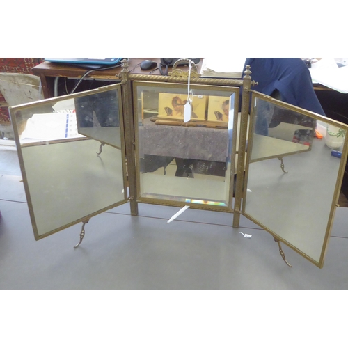 215 - A 1920s JB Brevete brass and silver plated folding triptych dressing table mirror 