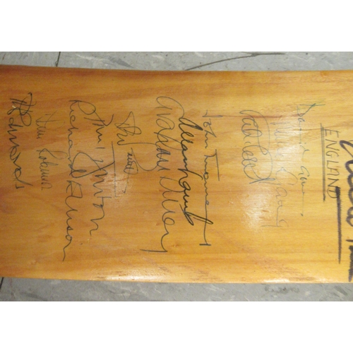 218 - Two cricket bats  bearing signatures, one inscribed Hounslow 1907, the other India V England 19... 