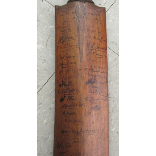 218 - Two cricket bats  bearing signatures, one inscribed Hounslow 1907, the other India V England 19... 