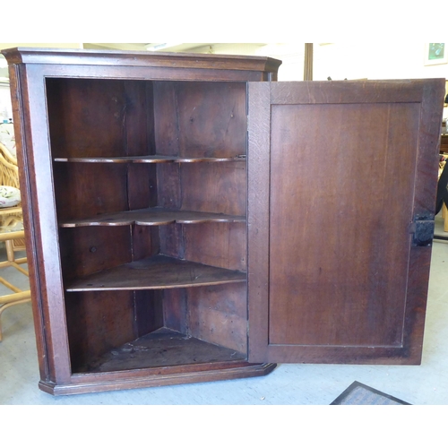 230 - A George III oak corner cabinet  39