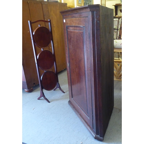 230 - A George III oak corner cabinet  39